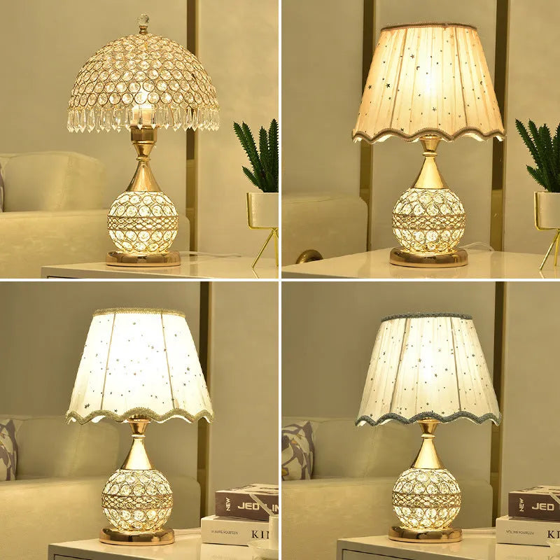 Gold crystal desk lamp with iron art base on wooden bedside table