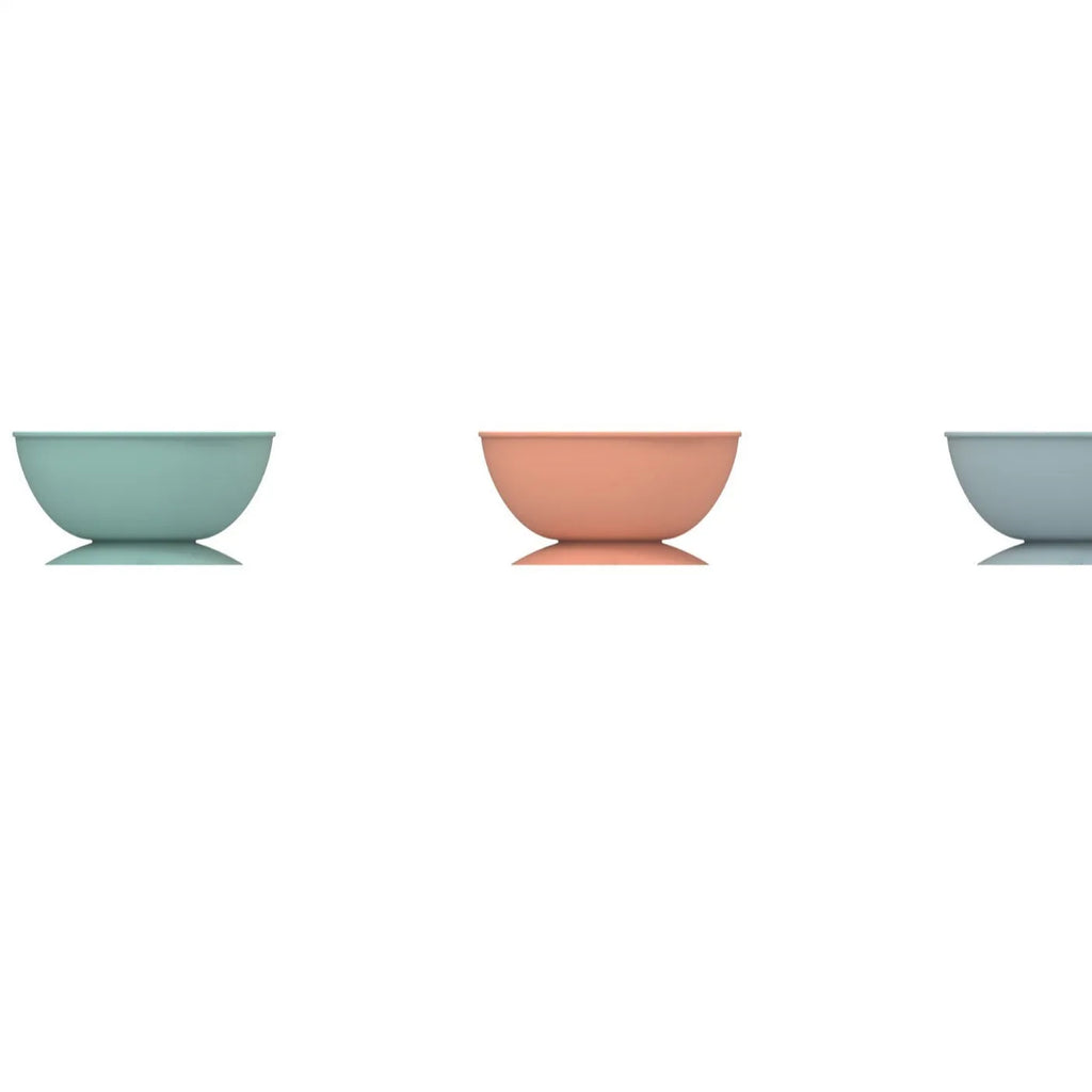 Cyan silicone dog slow feeder bowl with suction cup base and textured interior