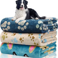 Cartoon print pet blanket in blue dog design showing double-sided thickened flannel construction