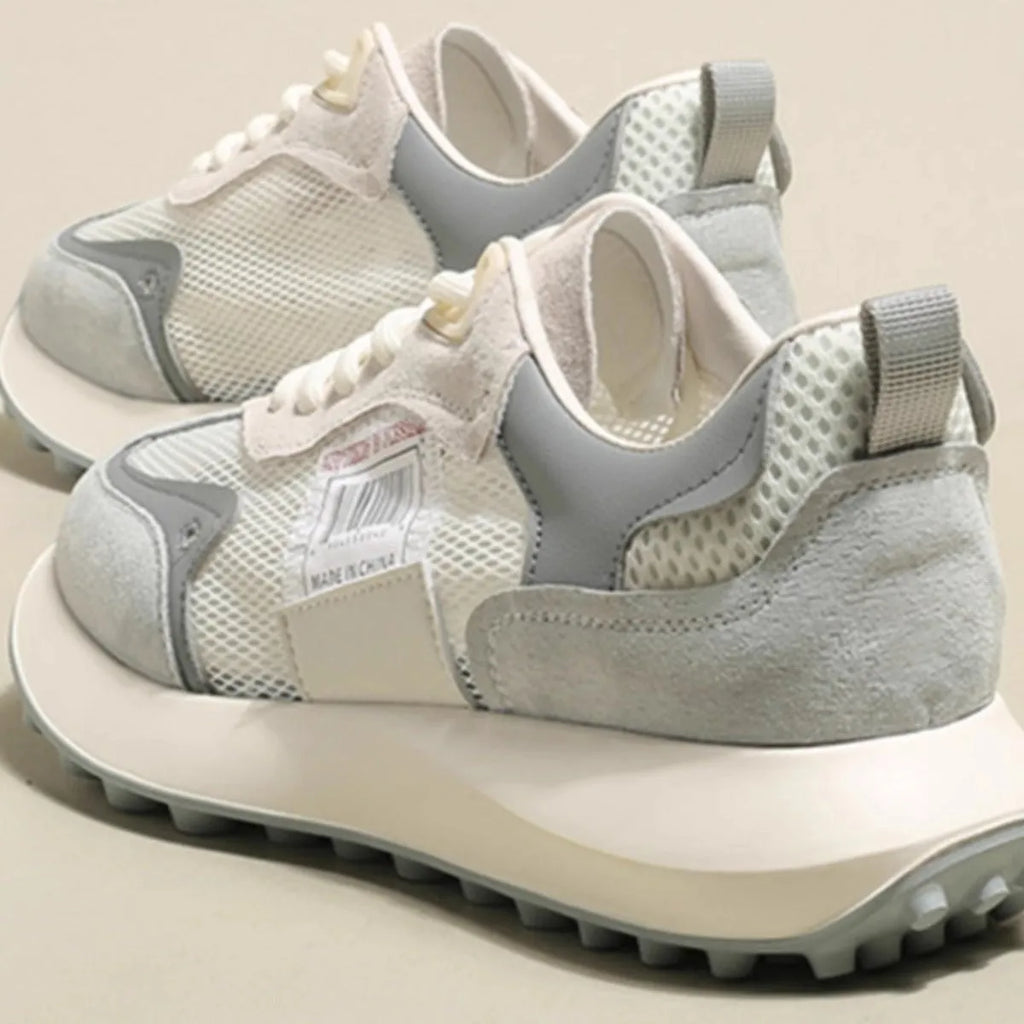 Women's grey and pink retro sneakers with mesh lining and rubber soles in low-top flat heel design