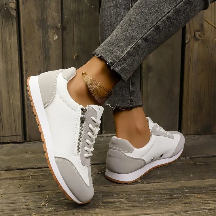 Women's flat-heeled shoes in artificial PU, available in Champagne, Gray, and White colour options.