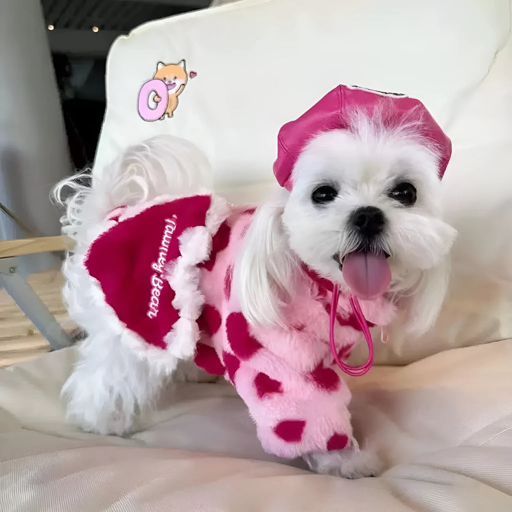 British-style pink warm dog coat for small breed on size chart showing XS to 2XL options
