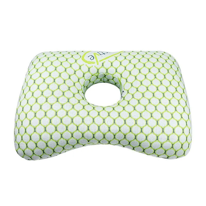 Beauty salon single hole ear pillow for adults in grey colour on a treatment bed.