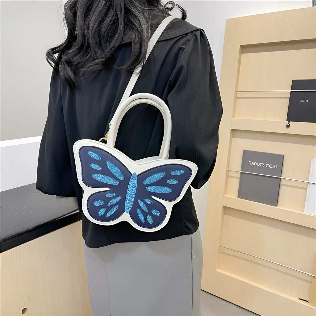 Square PU leather crossbody bag with contrasting colour elements showing dimensions 27cm by 14cm
