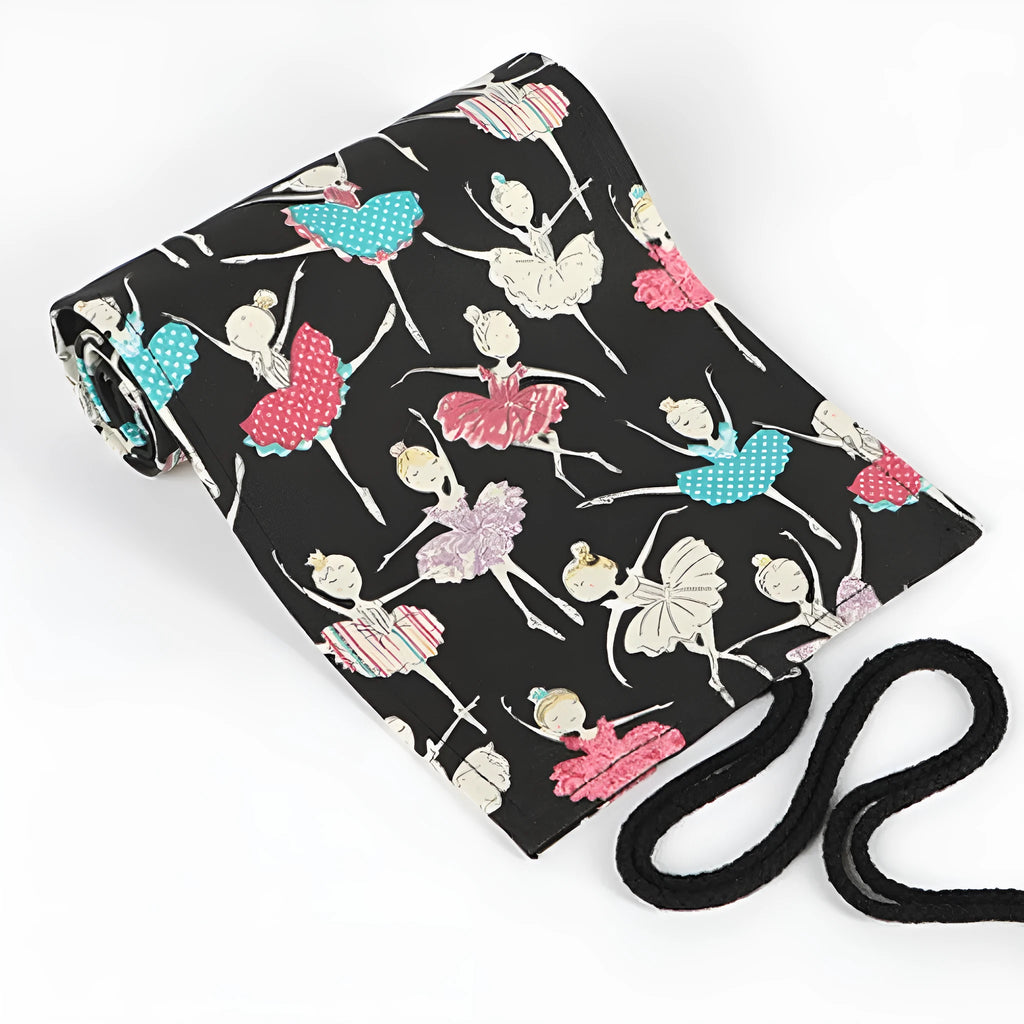 Square canvas rolling pencil case with ballet girl print, showing multiple holes for pencils.