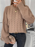 Women's beige round neck casual polyester sweater with loose fit on hanger