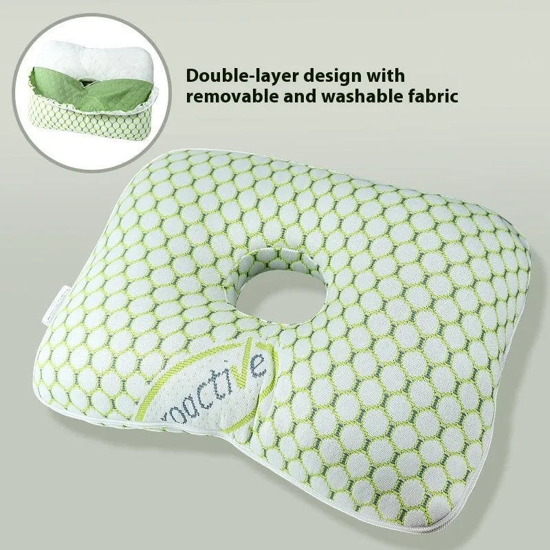Beauty salon single hole ear pillow for adults in grey colour on a treatment bed.