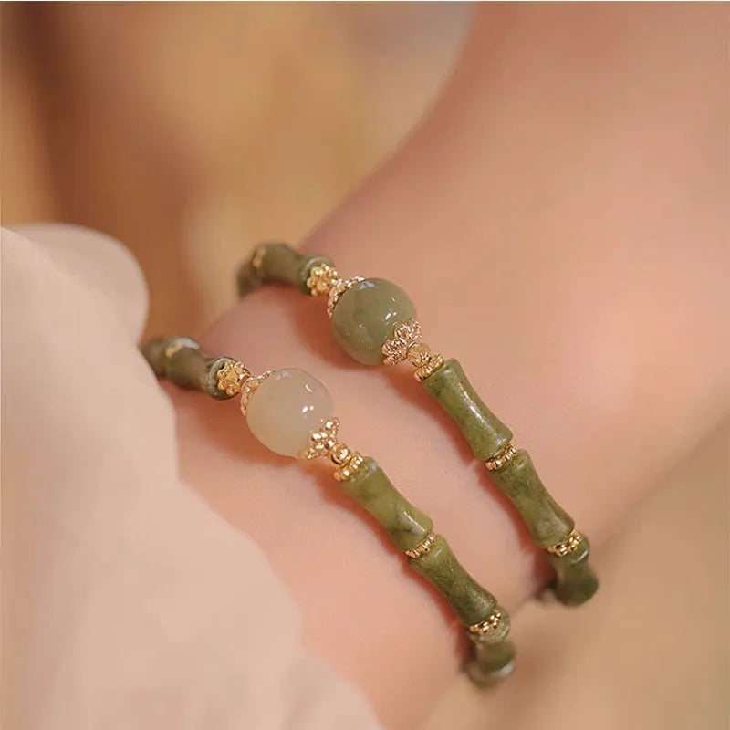 Geometric Hetian jade bracelet for women in dark green or light colour with round design elements