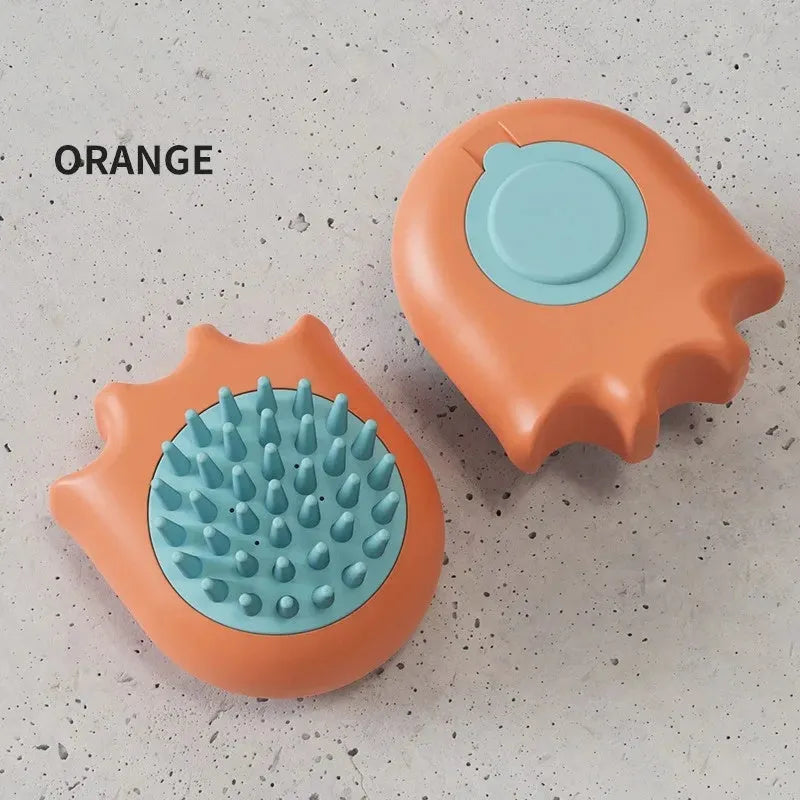 Blue pet bath brush with a built-in shampoo reservoir and massage comb bristles.