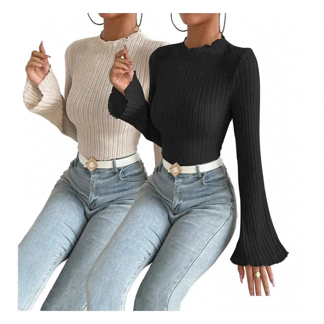 Long sleeve round neck polyester top in black with lantern sleeves, slim fit silhouette