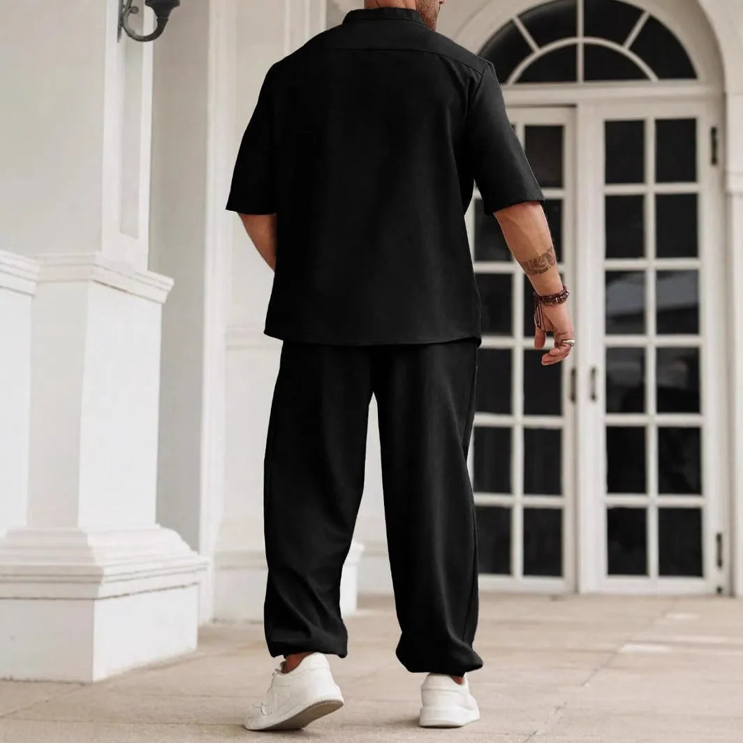 Men's casual apricot-coloured cotton linen short-sleeved shirt and trousers set laid flat.