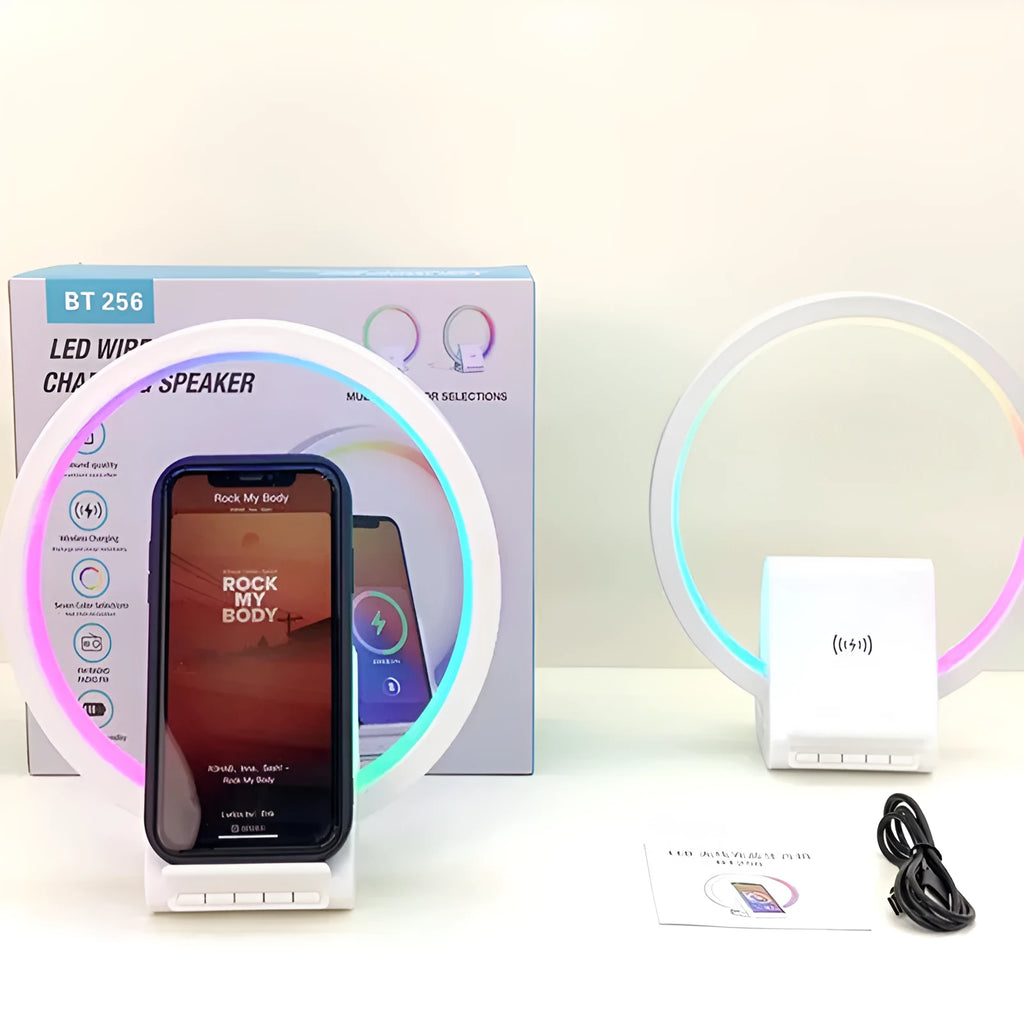 White rectangular smart Bluetooth speaker with integrated wireless charging pad and ambient lighting