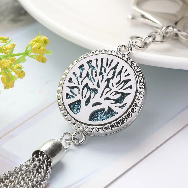 Silver alloy tassel car fragrance pendant hanging on a 50cm chain with colourful scented cotton pieces