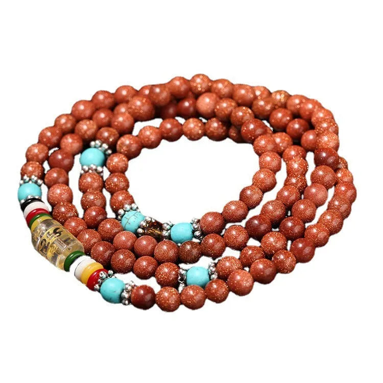 Women's multi-circle bracelet with 108 nugget sand beads, golden star stone accents, and retro fu character charms