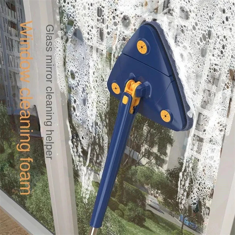 Blue extendable triangle cleaning mop with rotating head and long stainless steel pole on a tiled floor.
