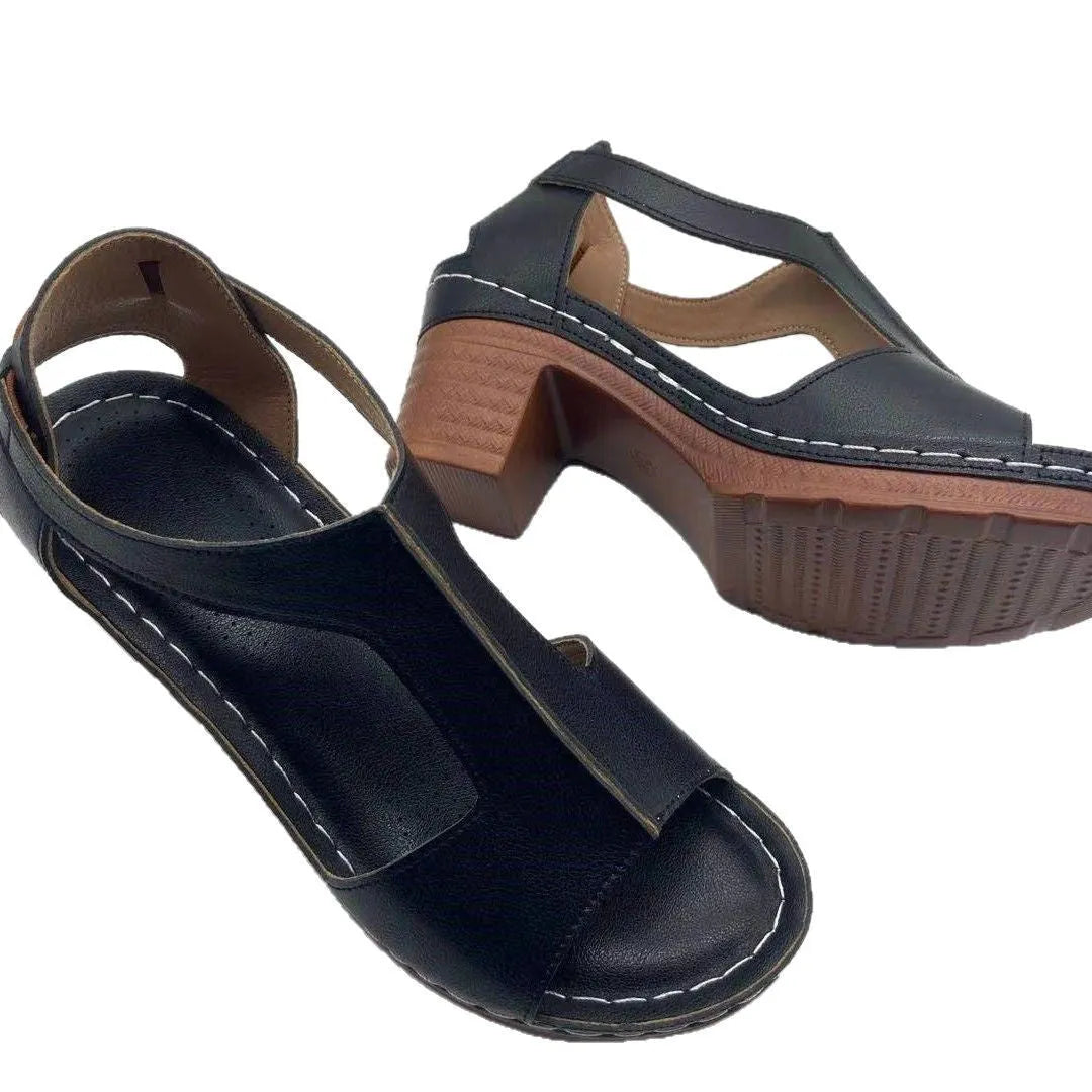 Plus size beige wedge sandals with peep toe, open sides, and a Roman-style ankle buckle.