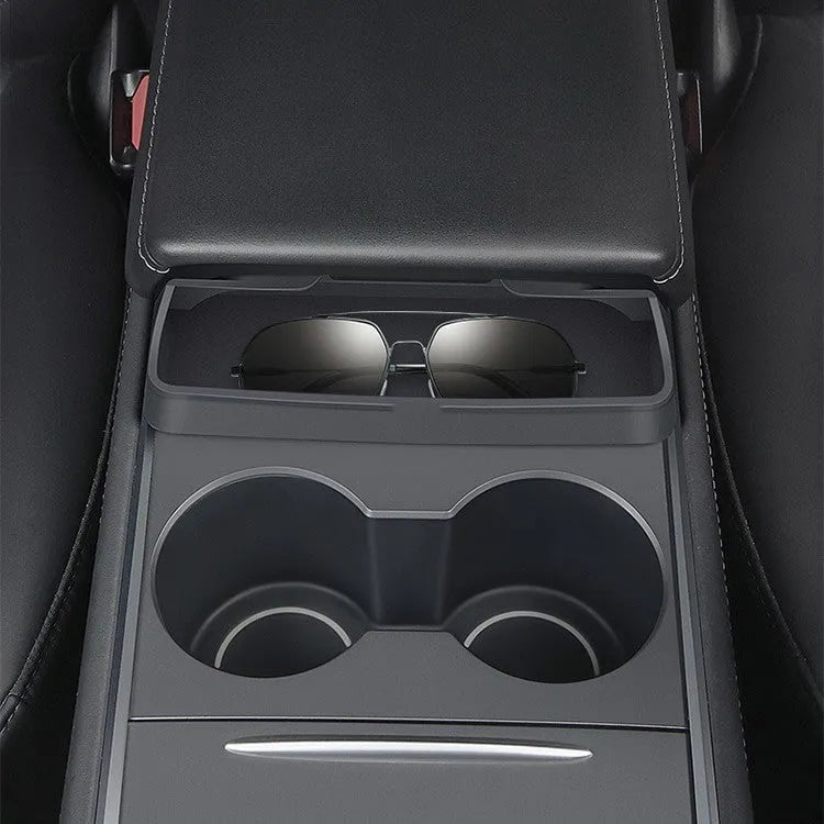 Black silicone glasses storage case mounted inside a Tesla Model 3/Y centre armrest console.