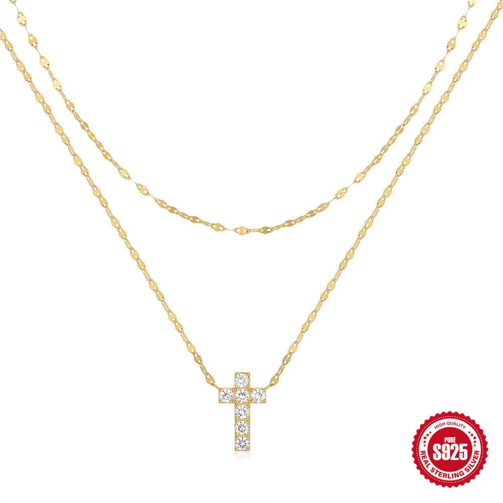 S925 sterling silver double layer twin diamond cross pendant necklace on a clavicle chain.