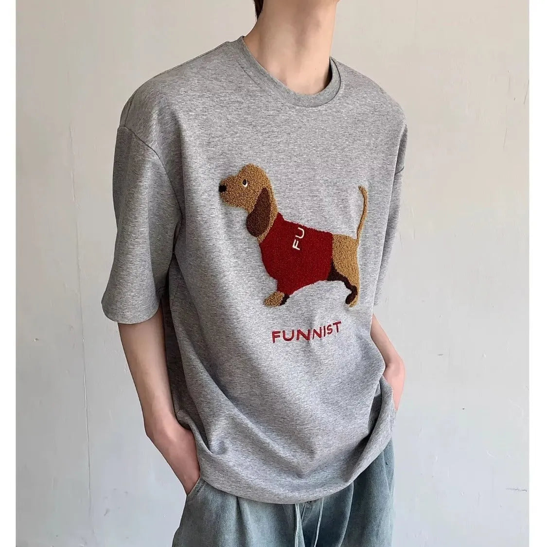 Men's grey t-shirt with embroidered sausage dog design on front