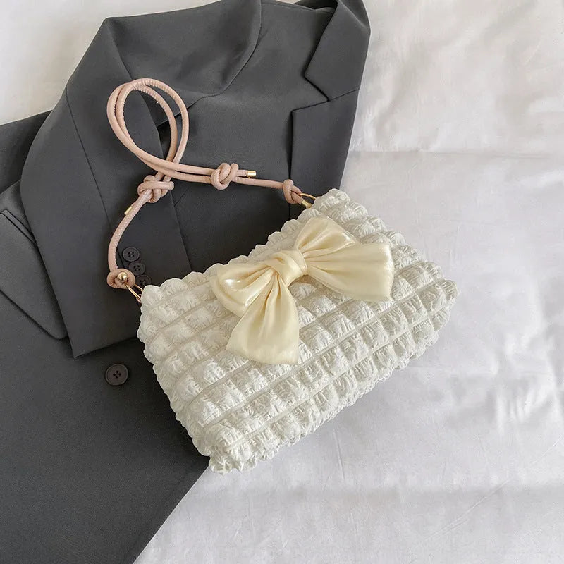 Women's one-shoulder canvas handbag in horizontal square shape with sandwich pocket and street trend styling