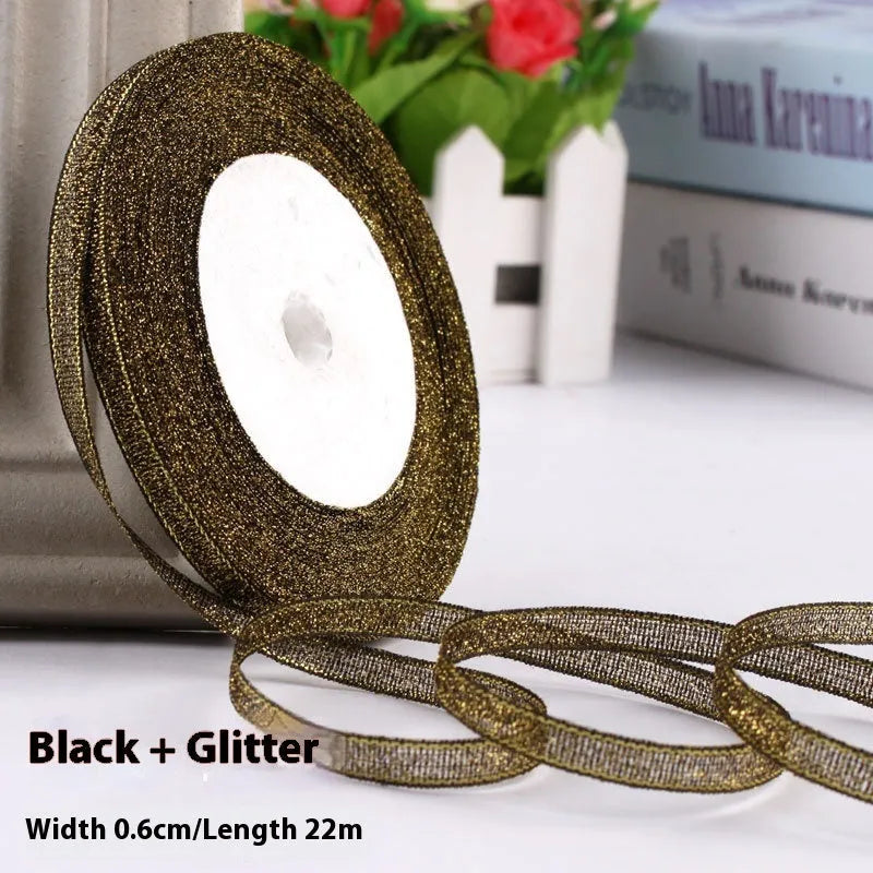 Roll of polyester gift packaging ribbon with 0.6cm width and 22 metre length in various colour options