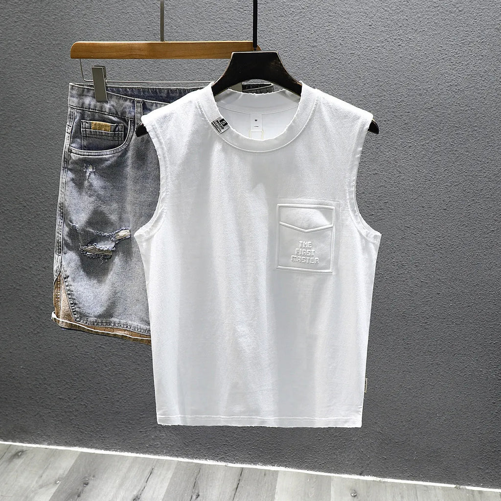 Cotton sleeveless t-shirt in loose fit with straight hem, available in white or black colours