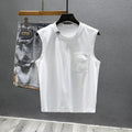 Cotton sleeveless t-shirt in loose fit with straight hem, available in white or black colours