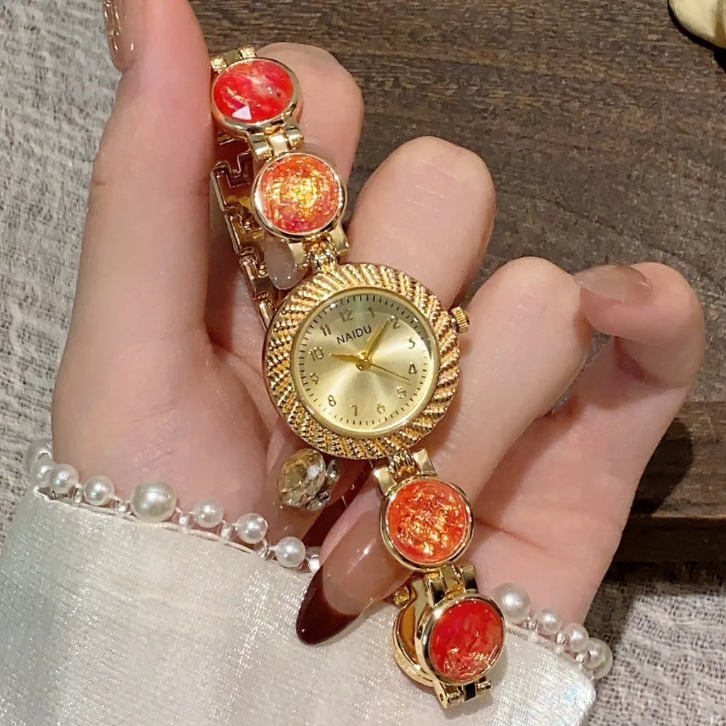 Women's round quartz watch with 25mm dial in one of six colours: milky white, dark green, purple, light green, cherry pink, or orange pink.