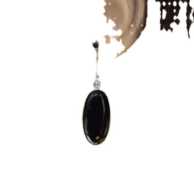 Women's earrings with oval black agate pendant and electroplated 925 silver geometric setting