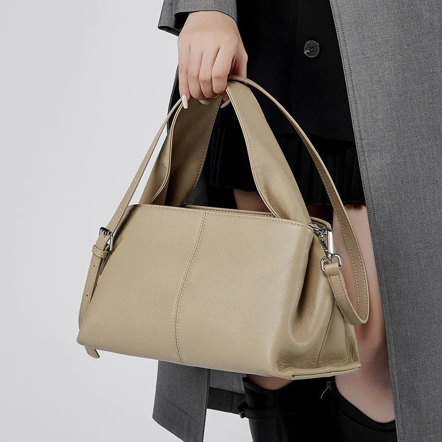 First layer cowhide messenger bag in horizontal square shape with double joint strap and retro texture in solid color