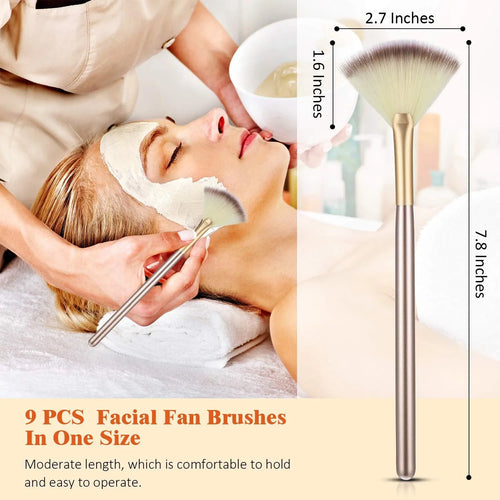 Ten champagne-coloured facial fan brushes with soft bristles and protective covers laid out.
