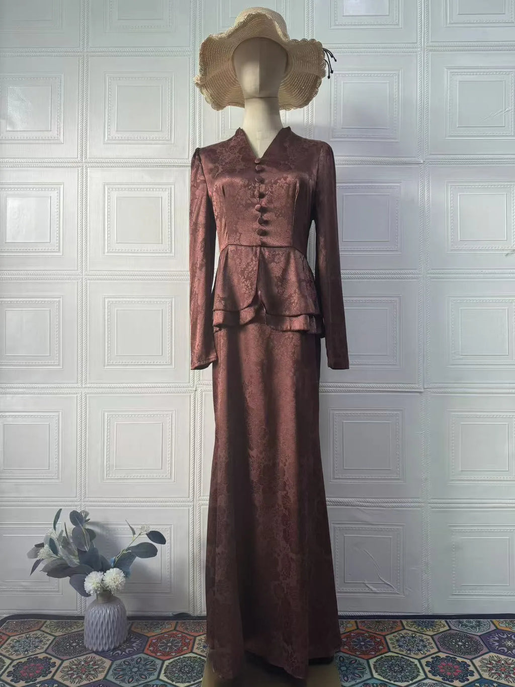 Dark brown retro dress with floral print, long sleeves, button detail, and a fake two-piece silhouette.