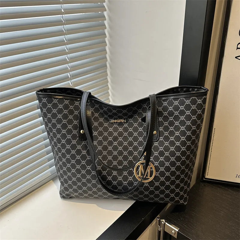 Western style shoulder bag in PU leather with sewing thread detail showing black colour option