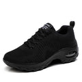 Women's red mesh sneakers with round toe and front lace-up design on flat heel