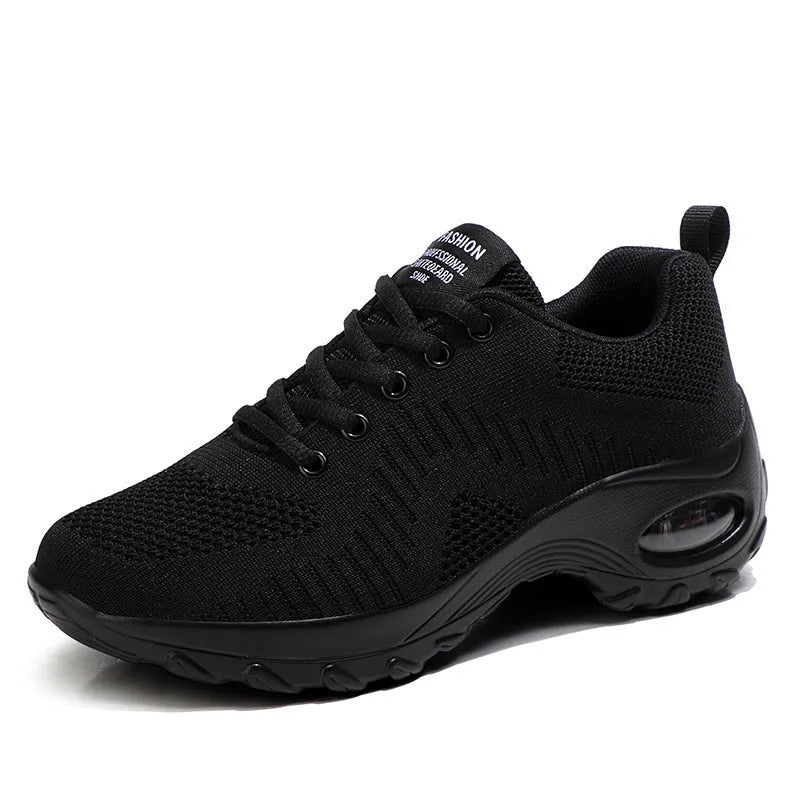 Women's red mesh sneakers with round toe and front lace-up design on flat heel