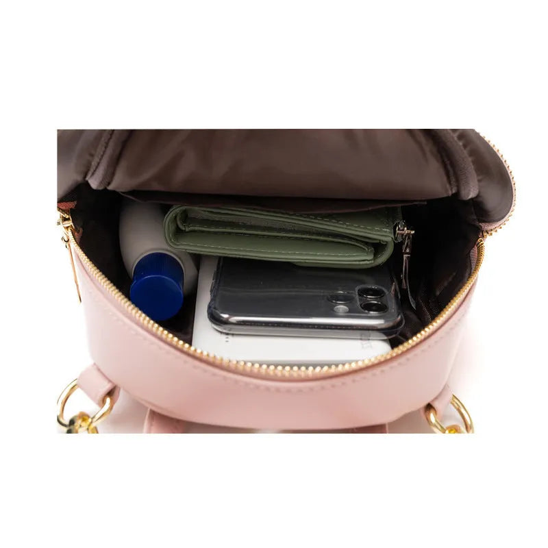 Soft PU mini backpack in street trend style with contrast colour elements and three-dimensional pockets