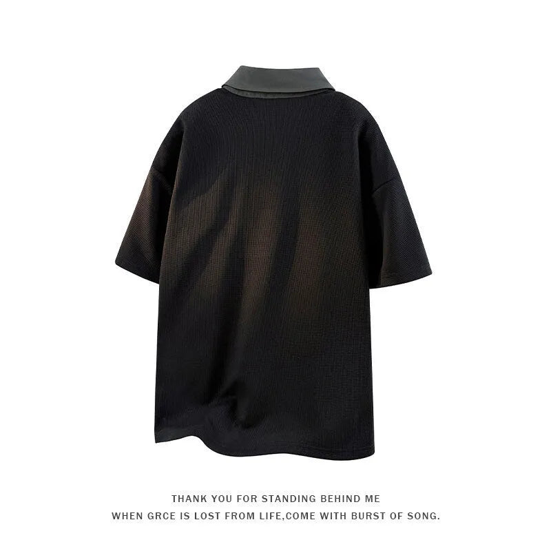 Men's black padded polo shirt sweater with a heavy collar and short sleeves, made from stretch spandex knit.