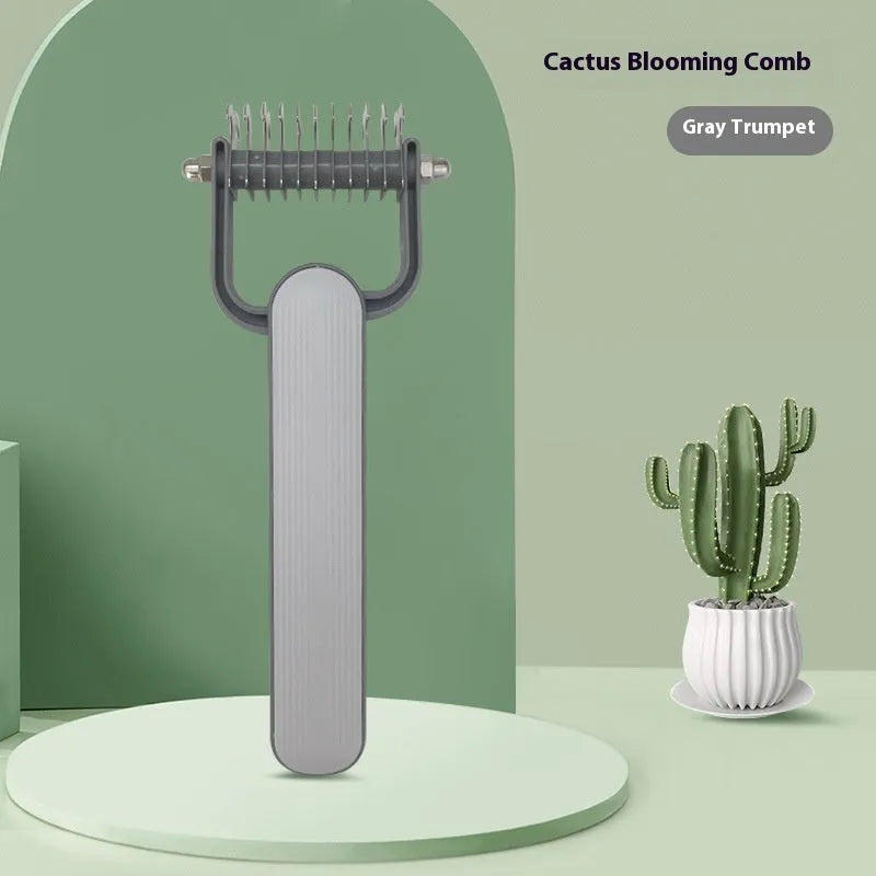 Green and grey pet hair unknotting comb for dogs in large and small sizes.