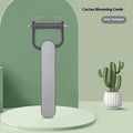 Green and grey pet hair unknotting comb for dogs in large and small sizes.