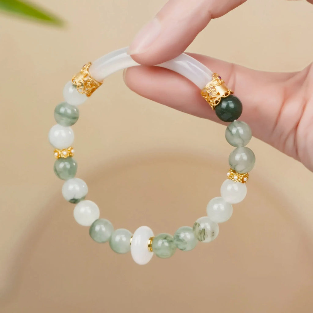 Light green Tian Shan Cui jade women's half bracelet with floating flower girl design in Chinese folk style.