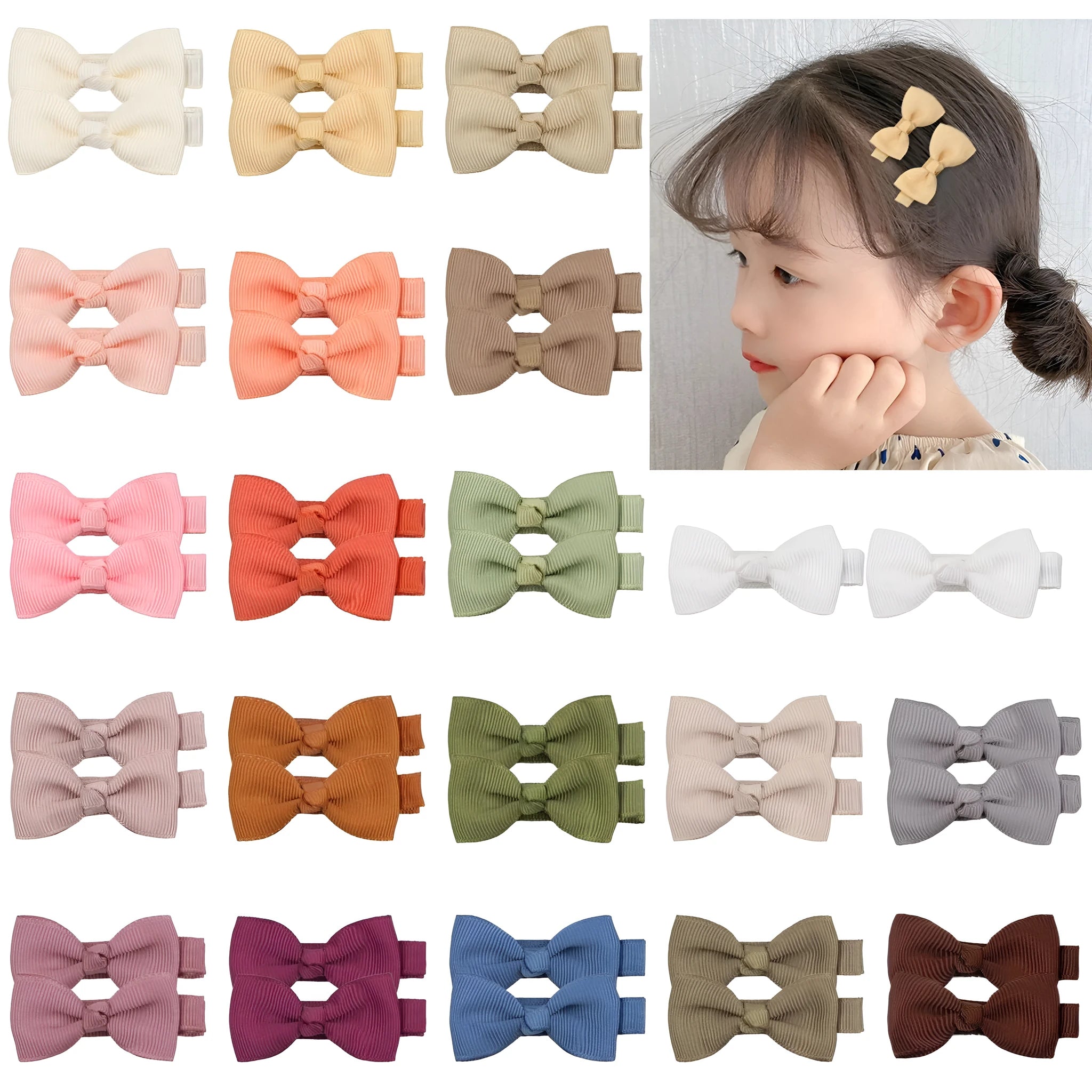 Forty pastel coloured hair clips for babies arranged by colour with fully lined no-slip design