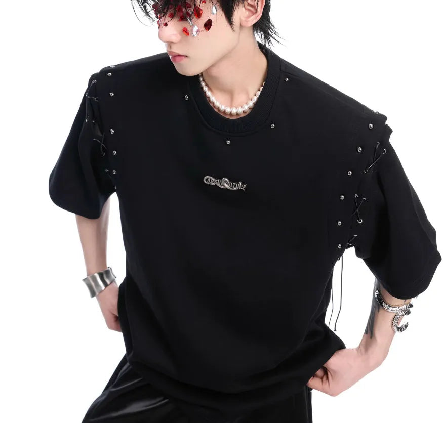 Women's black short sleeve top with a white lace-up cutout detail on the side.