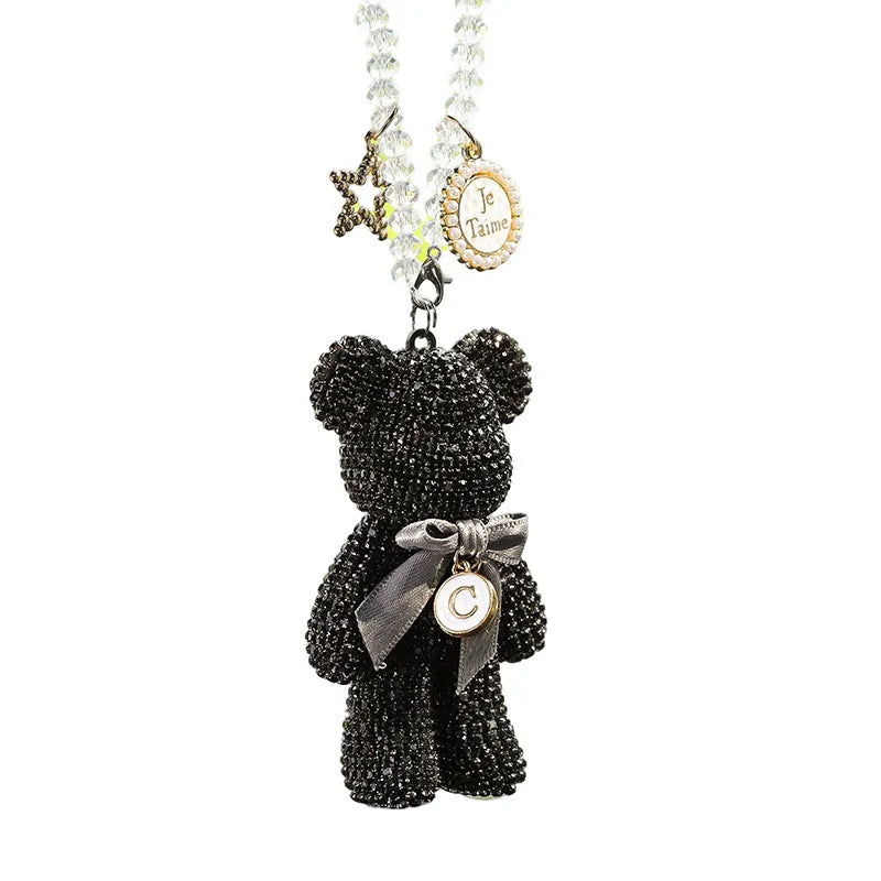 Violent bear-shaped car mirror pendant with embedded rhinestones in three colour options
