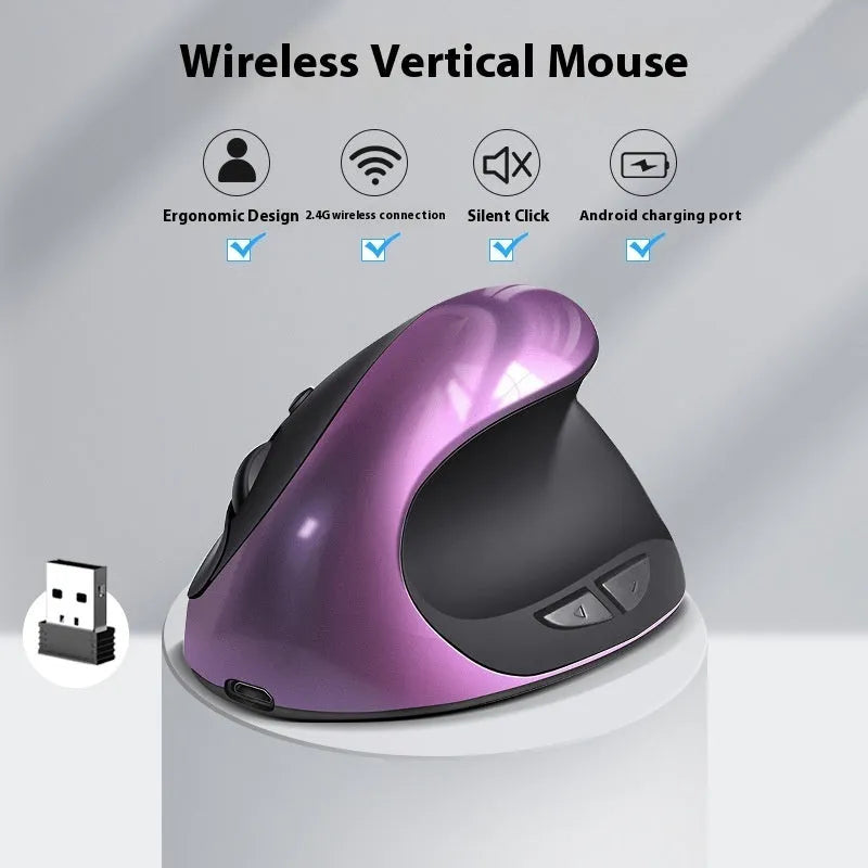 Wireless vertical ergonomic mouse in red colour on a desk next to a laptop.