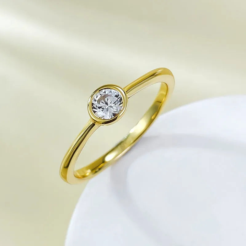 Minimalist sterling silver crown ring with smooth lines in R962 gold or platinum electroplate.