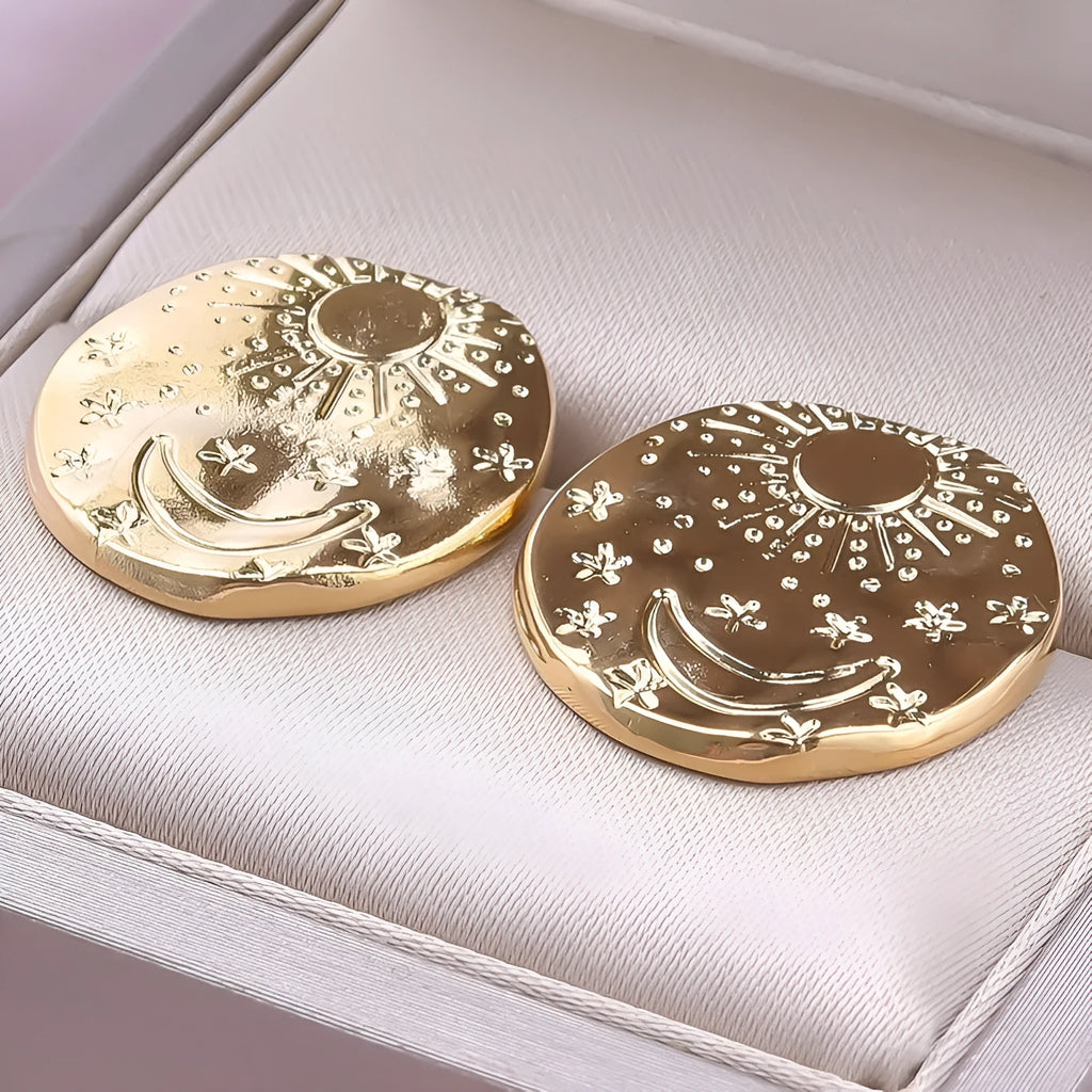Stainless steel geometry shell pattern stud earrings with gold electroplated finish