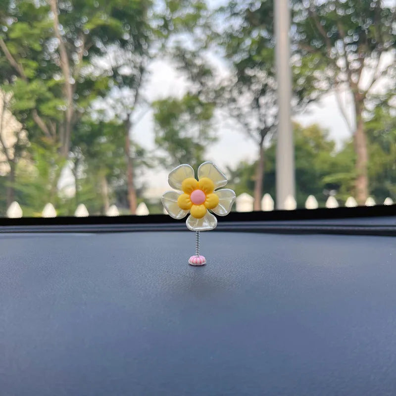 Plastic car decoration ornament with swing design in blue colour showing 5cm height measurement