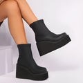 Black plus size women's platform wedge boots with a high shaft and waterproof sole.
