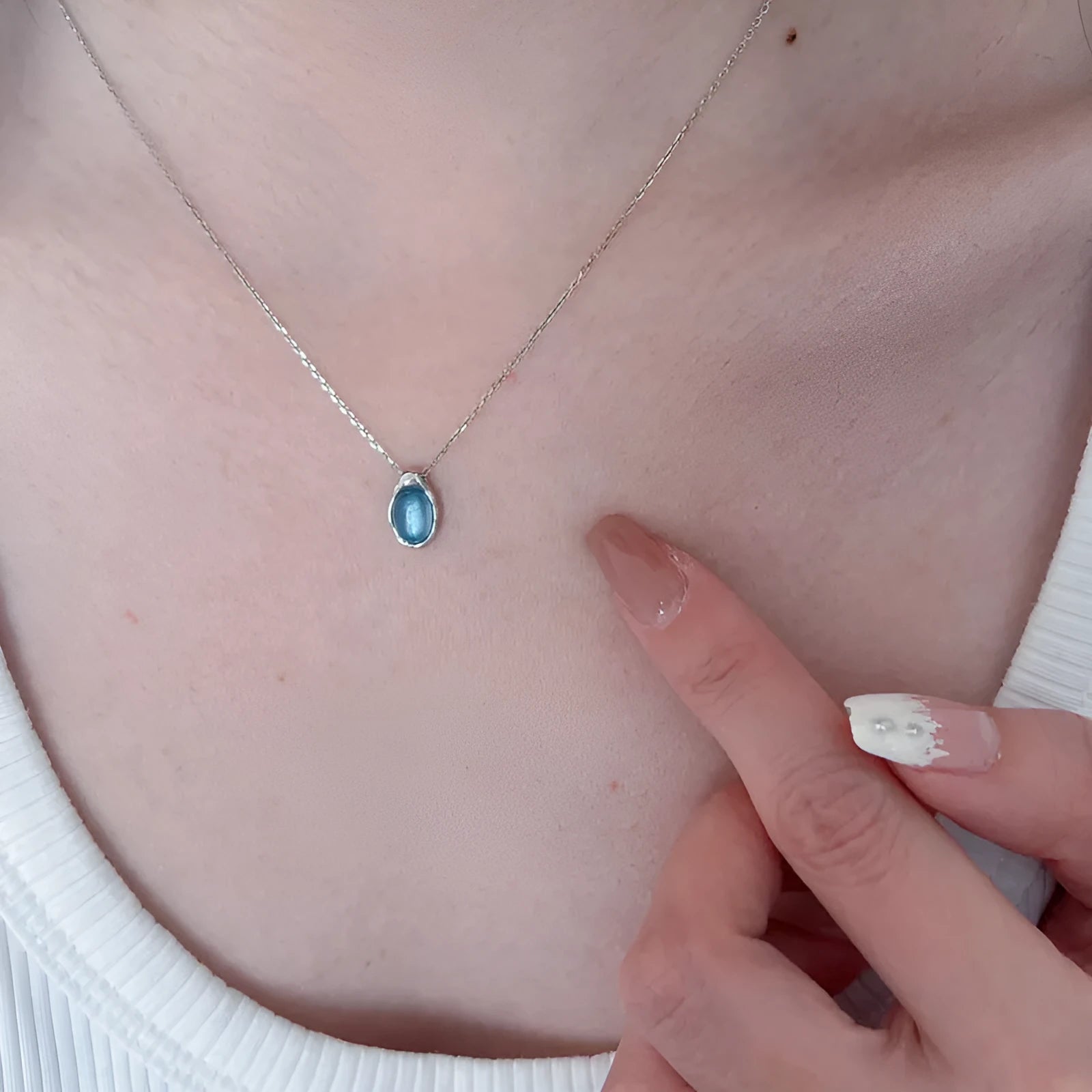 Navy blue water drop necklace with cross chain design in platinum colour, adjustable 41-50cm length