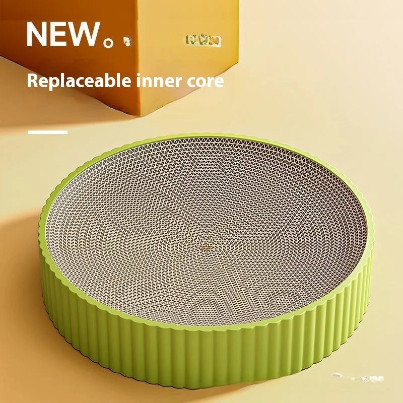 Green and white round cat scratching board measuring 55cm with replaceable corrugated cardboard scratching surfaces
